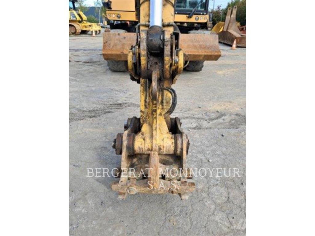 CAT M315F IVC Pelle sur pneus