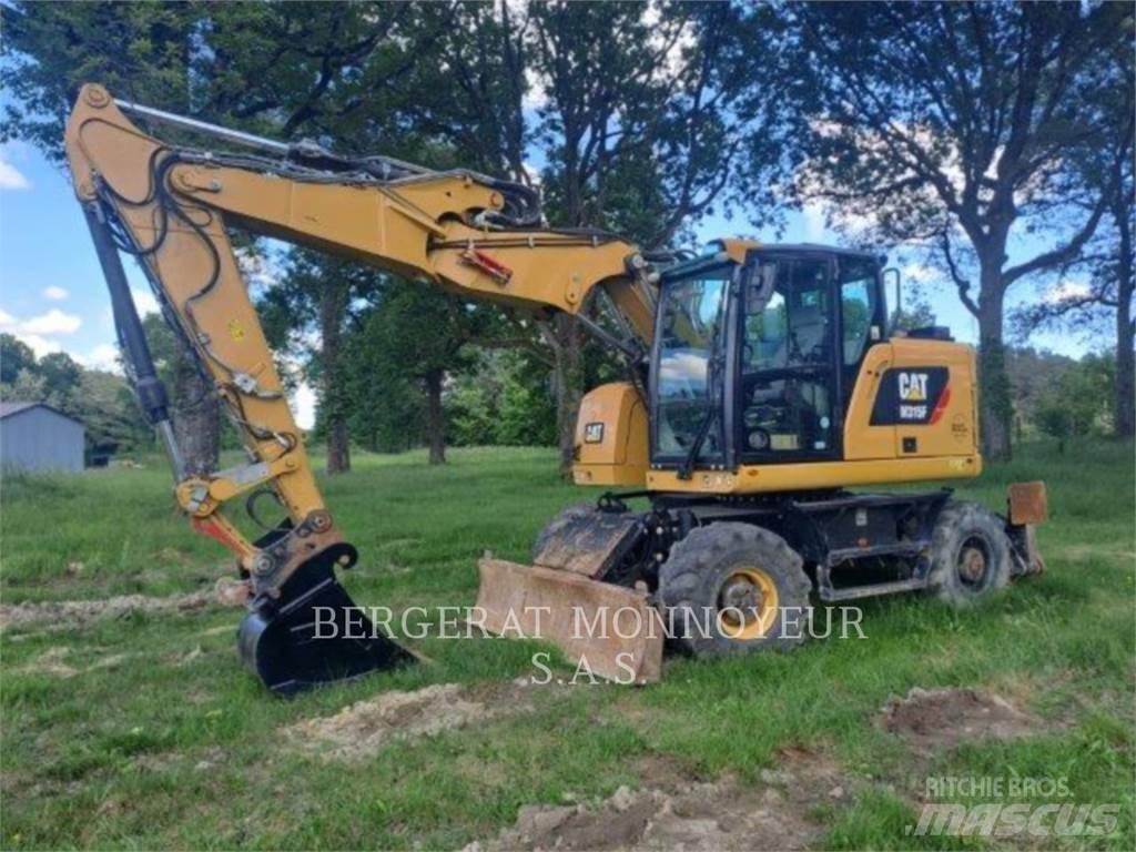 CAT M315F IVC Pelle sur pneus