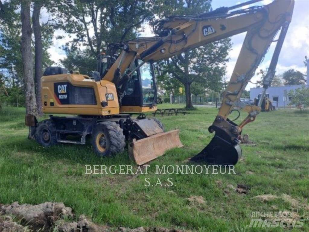 CAT M315F IVC Pelle sur pneus