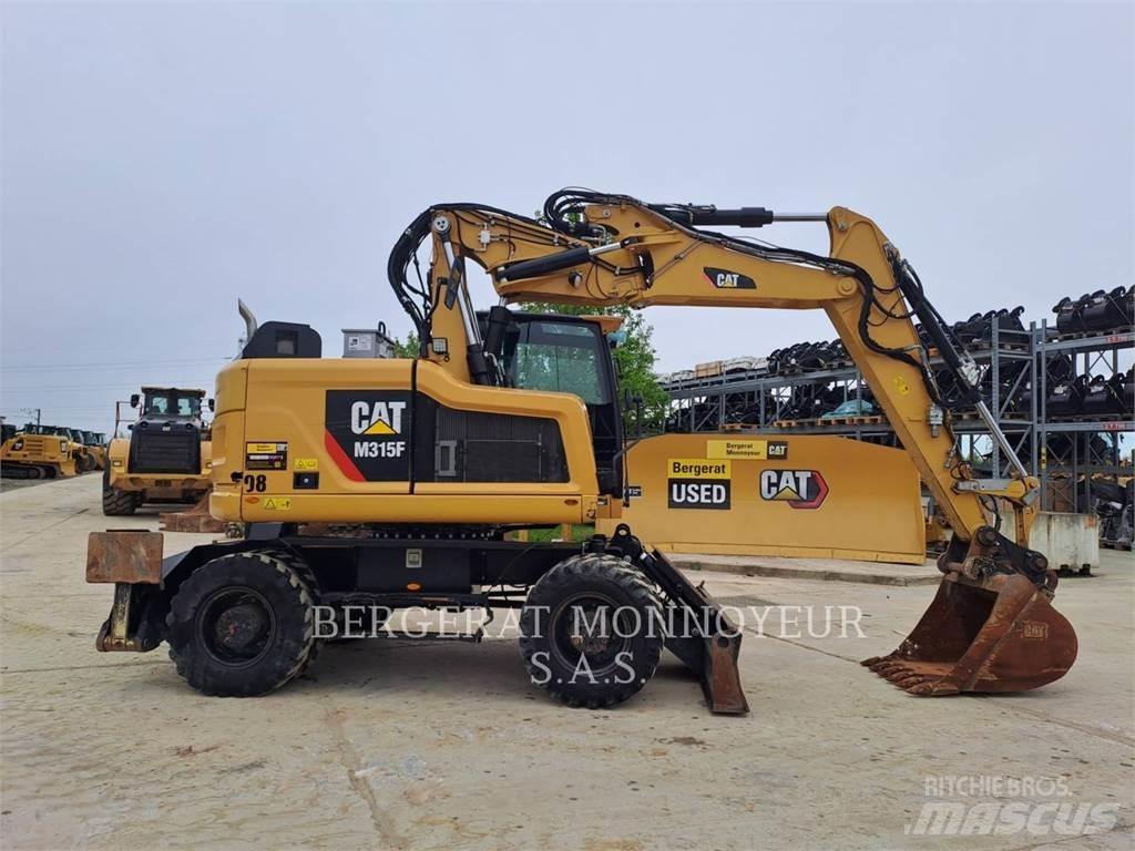 CAT M315F IVC Pelle sur pneus