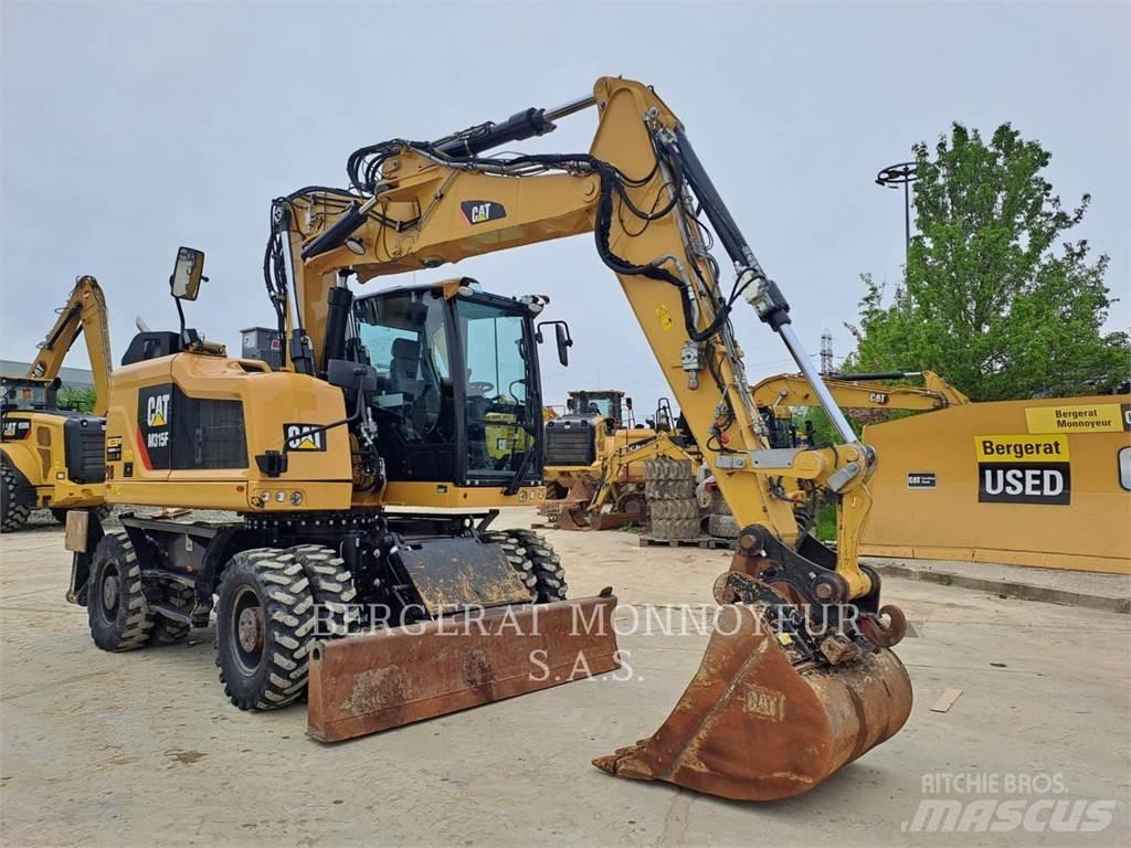 CAT M315F IVC Pelle sur pneus