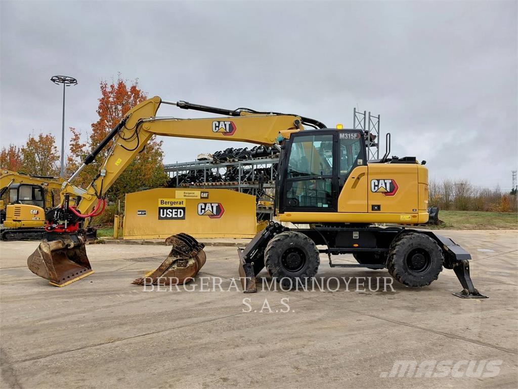 CAT M315F IVC Pelle sur pneus