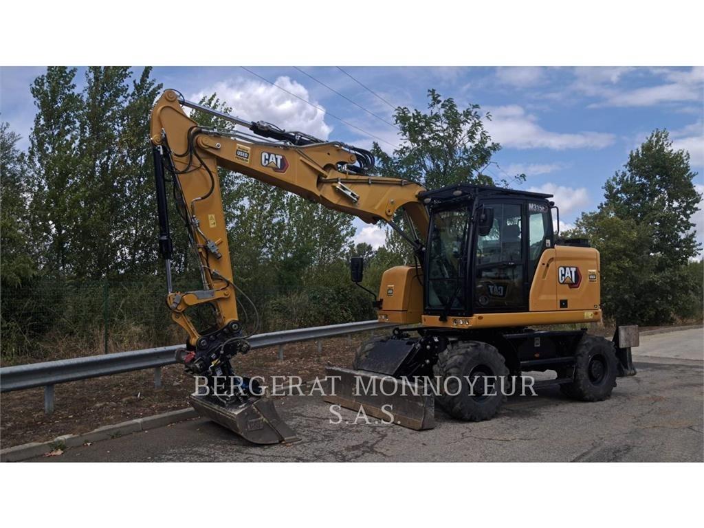 CAT M315F IVC Pelle sur pneus