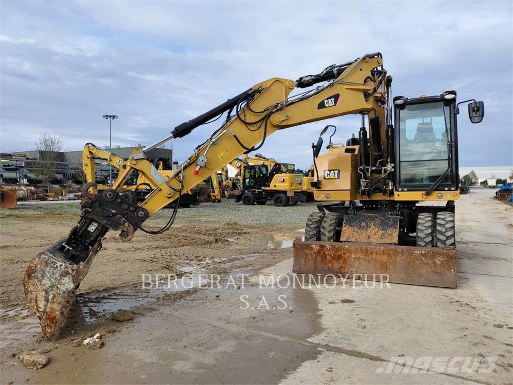 CAT M315F IVC Pelle sur pneus