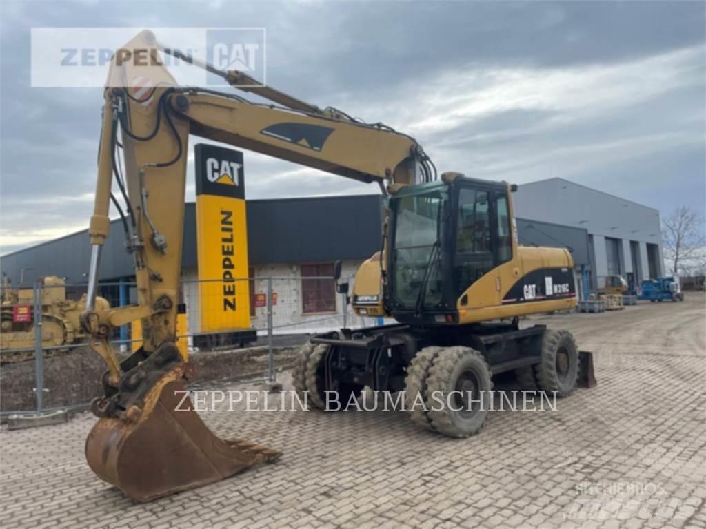 CAT M316C Pelle sur pneus