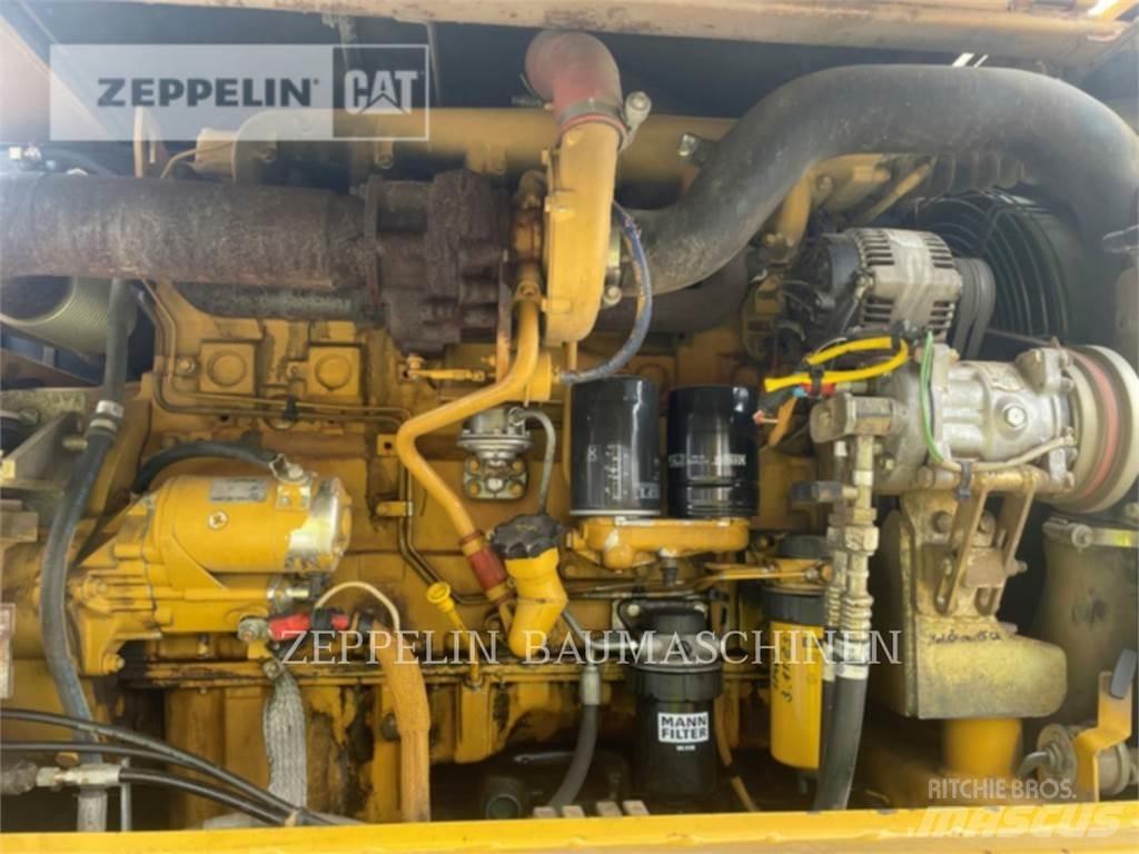 CAT M316C Pelle sur pneus
