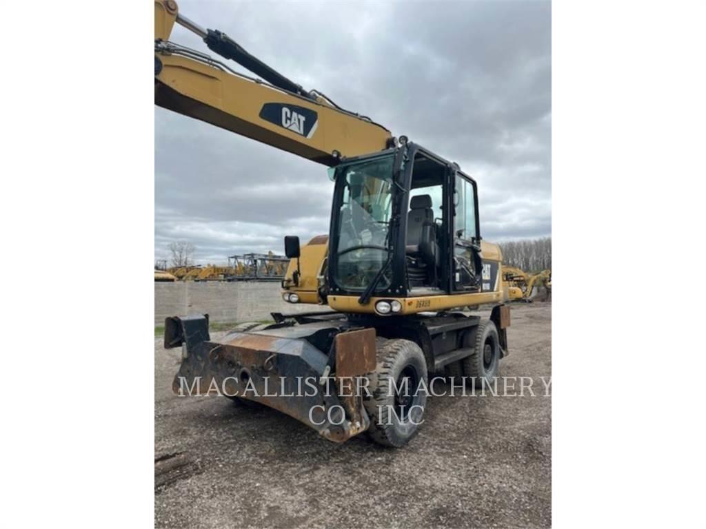 CAT M316D Pelle sur pneus