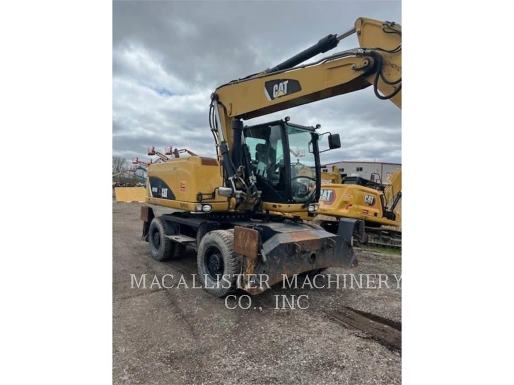 CAT M316D Pelle sur pneus