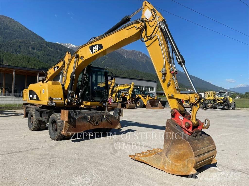 CAT M316D Pelle sur pneus