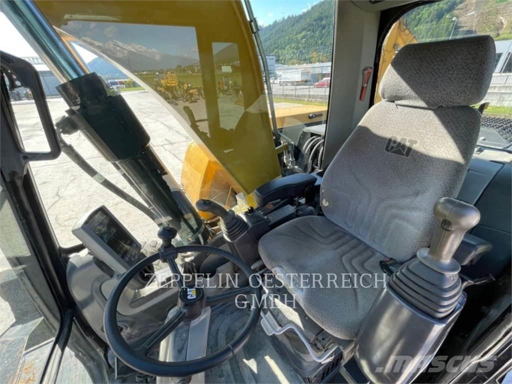 CAT M316D Pelle sur pneus