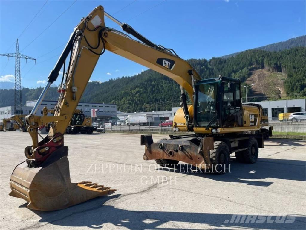 CAT M316D Pelle sur pneus