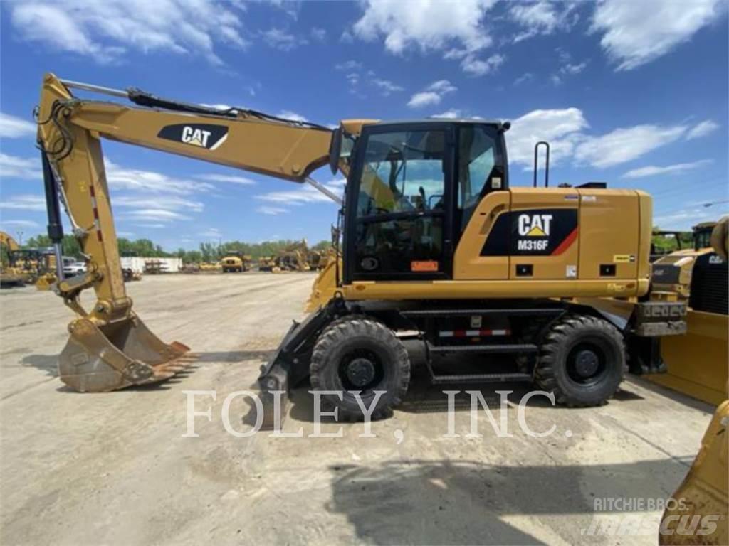 CAT M316F Pelle sur pneus