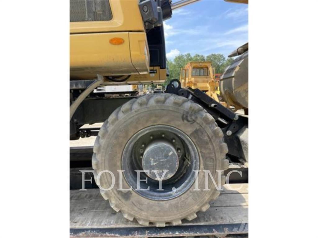 CAT M316F Pelle sur pneus