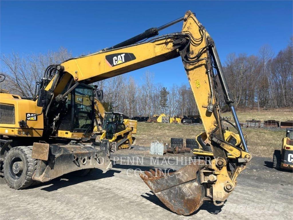 CAT M316F Pelle sur pneus