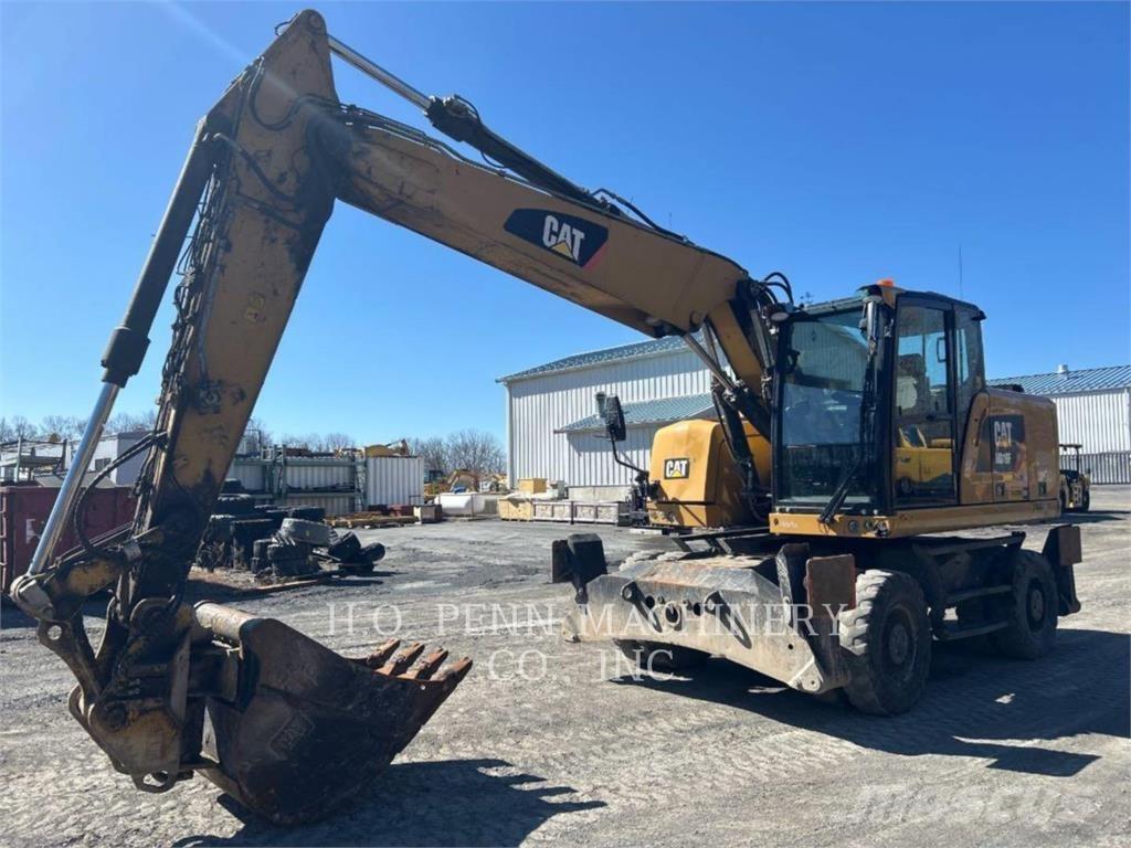 CAT M316F Pelle sur pneus