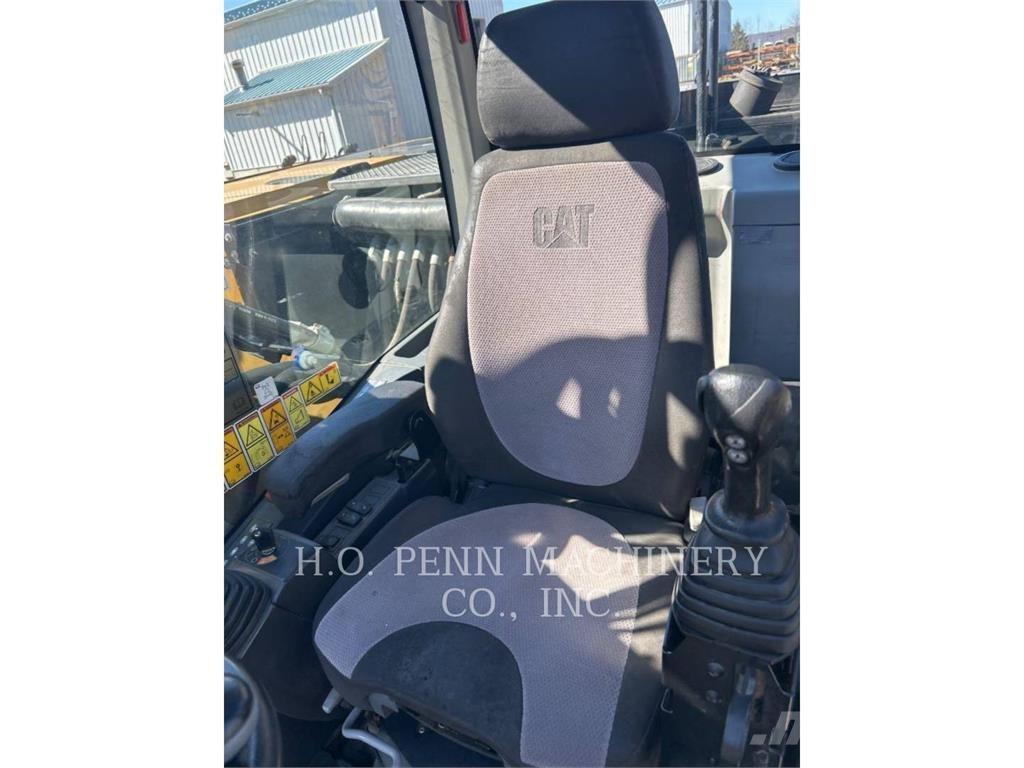 CAT M316F Pelle sur pneus