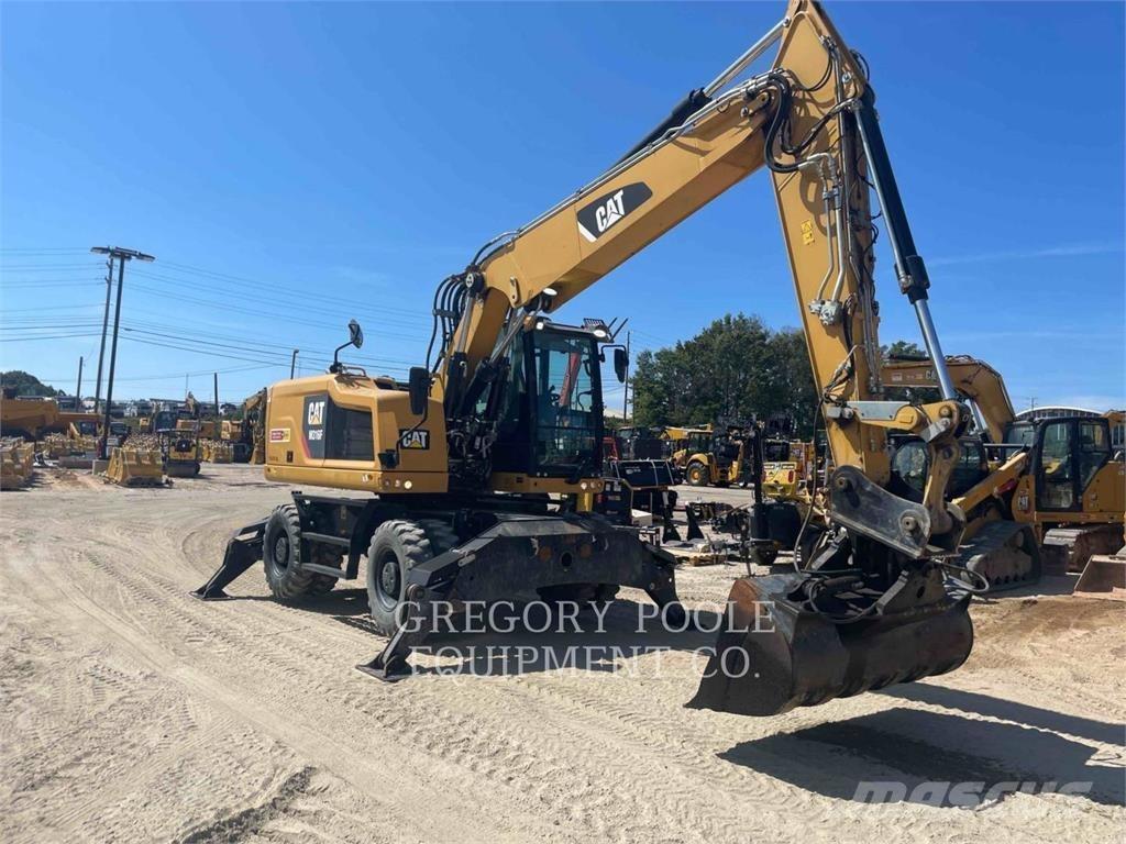 CAT M316F Pelle sur pneus