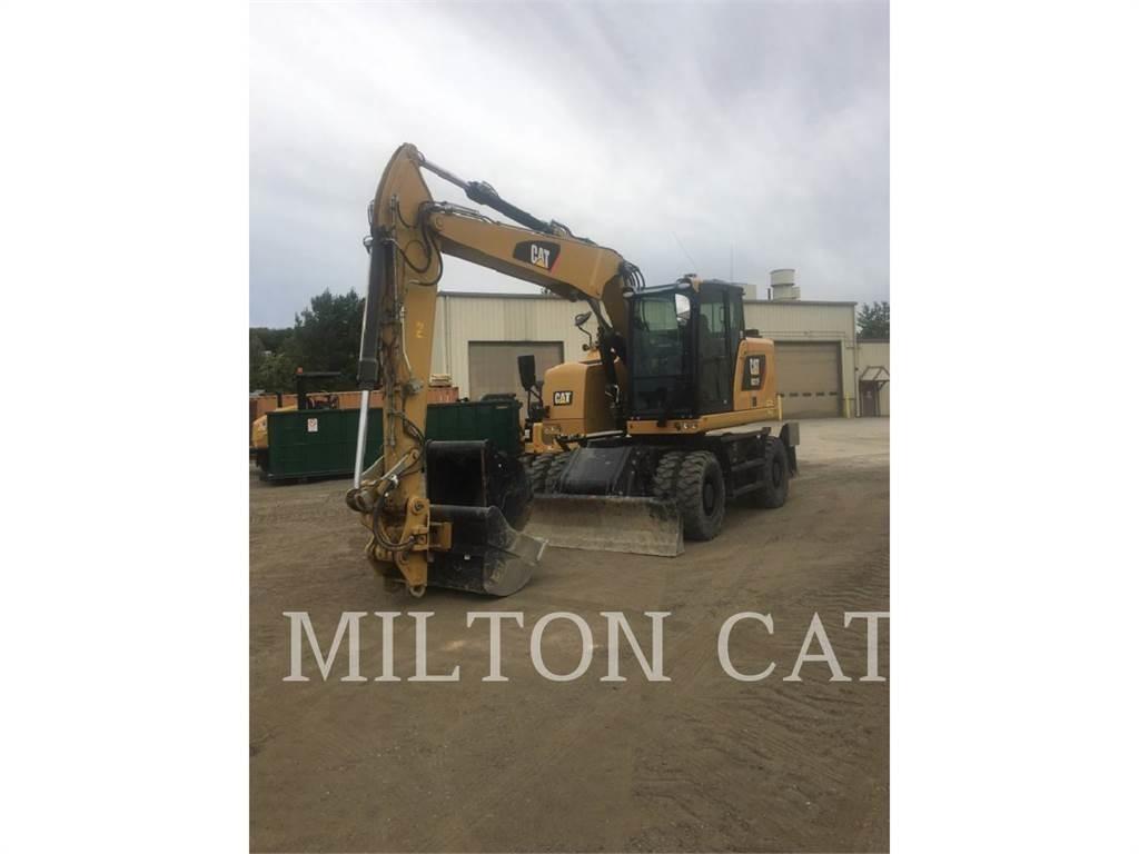 CAT M317F Pelle sur pneus