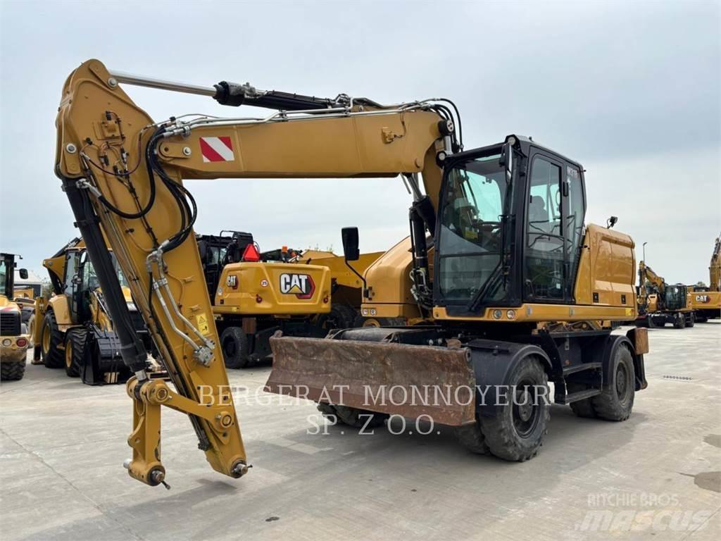 CAT M318 Pelle sur pneus