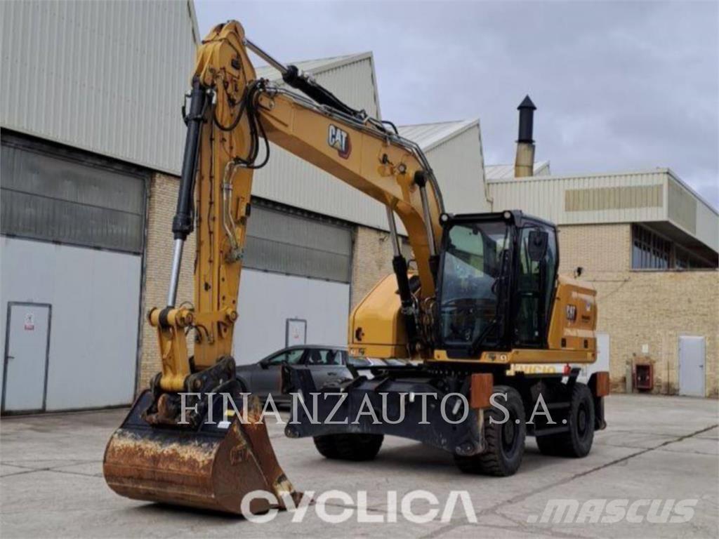 CAT M318 Pelle sur pneus