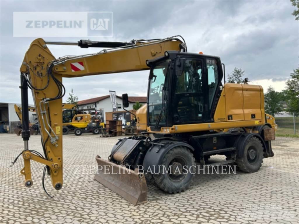 CAT M318-07A Pelle sur pneus