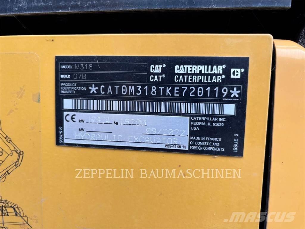 CAT M318-07A Pelle sur pneus