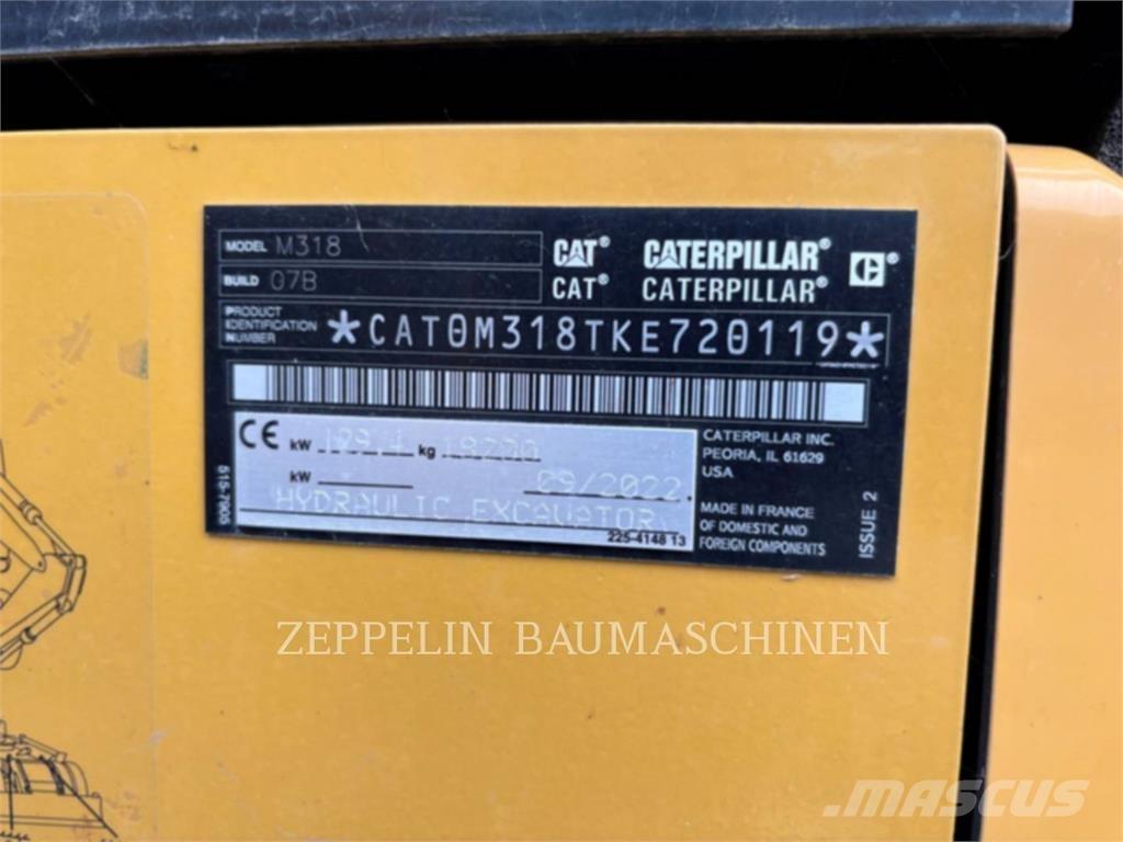 CAT M318-07A Pelle sur pneus