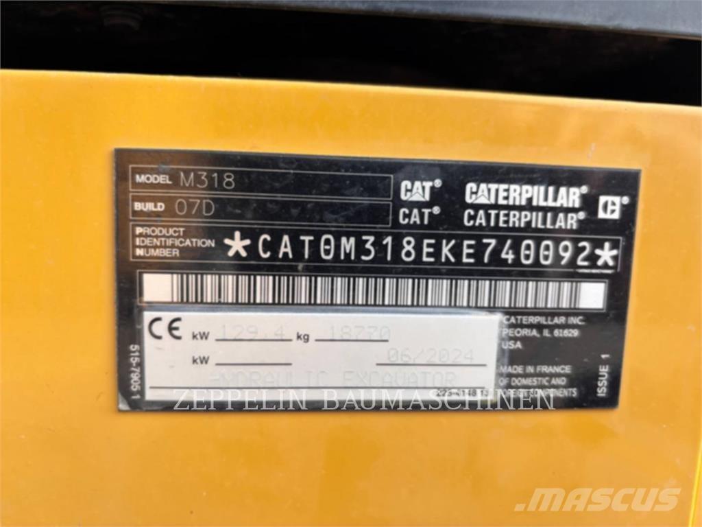 CAT M318-07A Pelle sur pneus