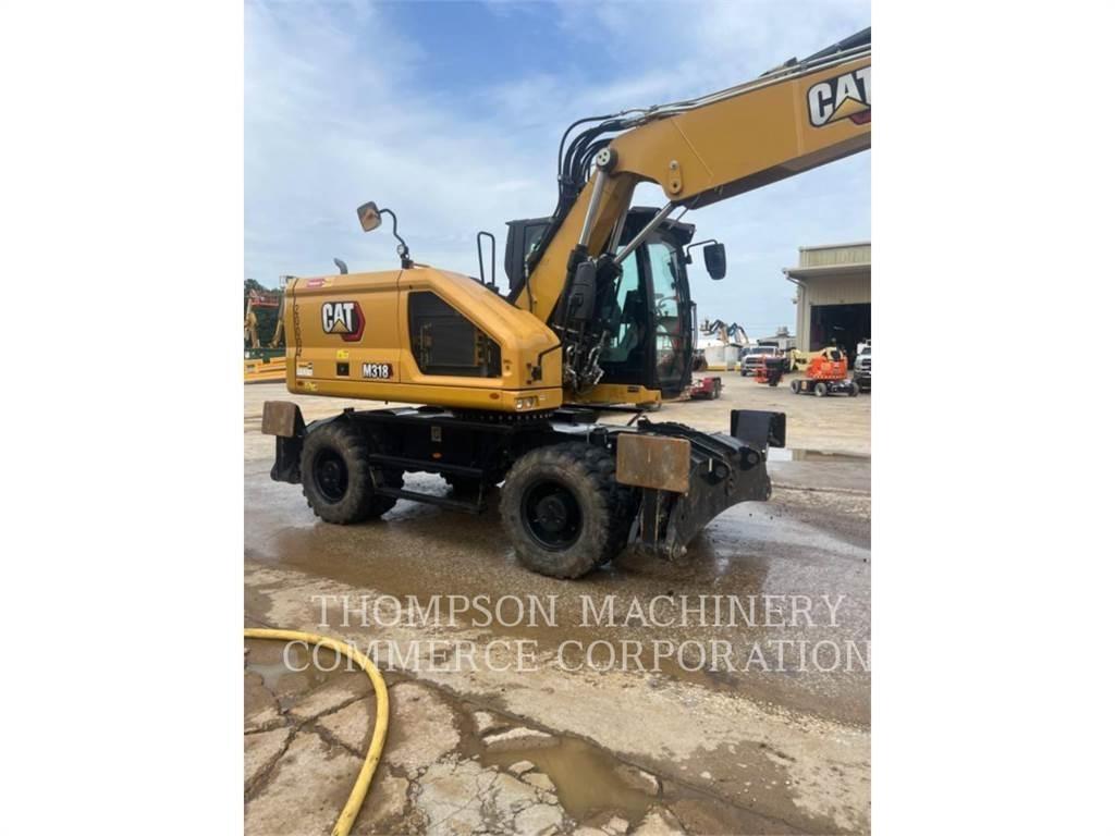 CAT M31807 Pelle sur pneus