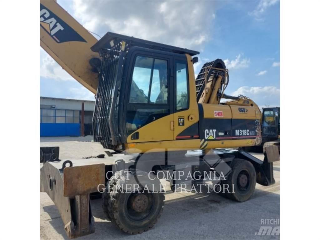 CAT M318C Pelle sur pneus