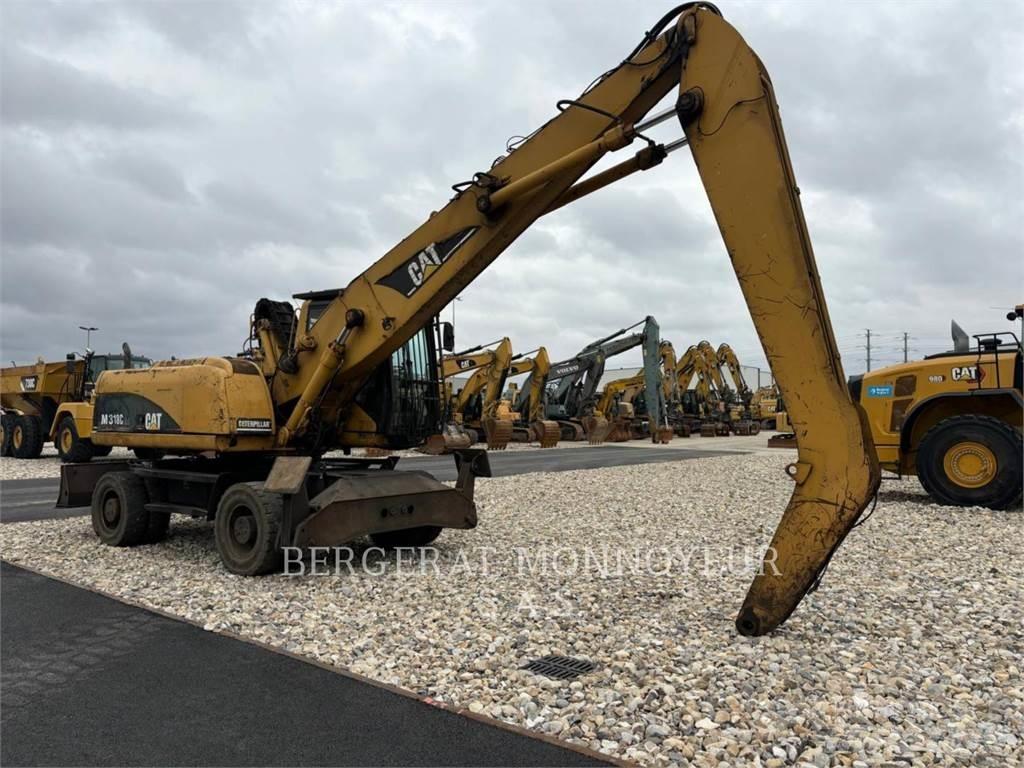 CAT M318C Pelle sur pneus