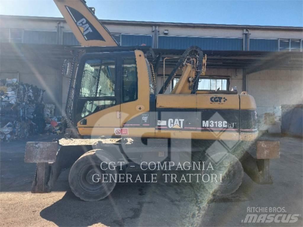 CAT M318CMH Pelle sur pneus