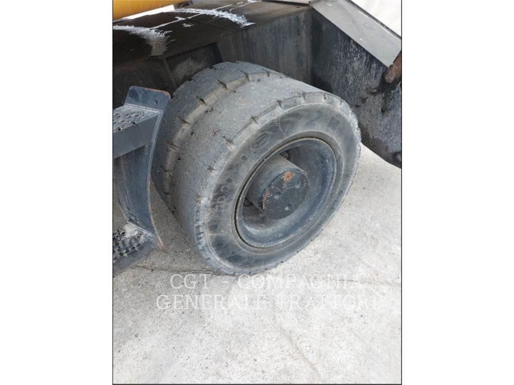 CAT M318D MH Pelle sur pneus