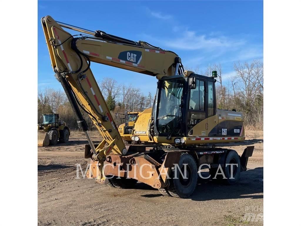 CAT M318D PM Pelle sur pneus