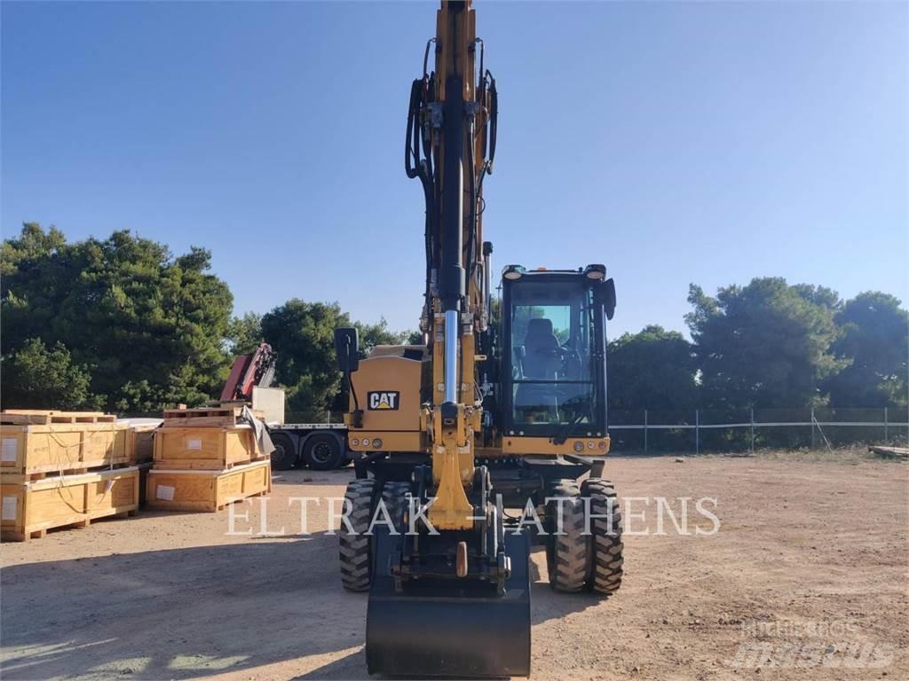 CAT M318F Pelle sur pneus