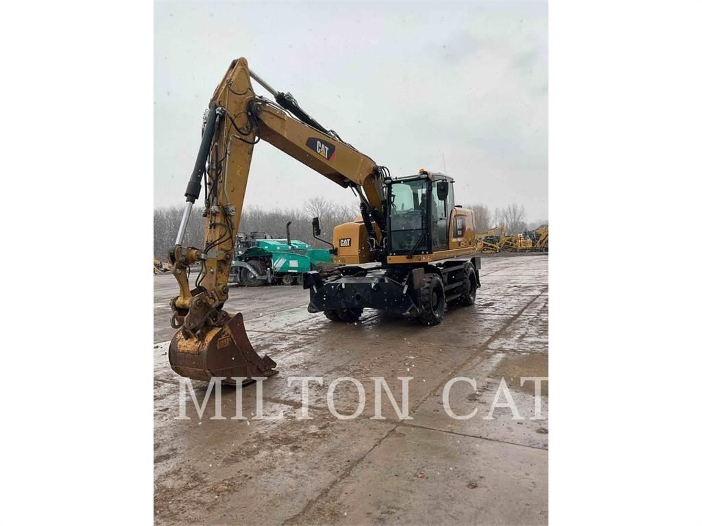 CAT M318F Pelle sur pneus