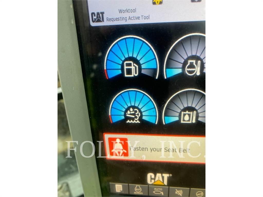 CAT M318F Pelle sur pneus