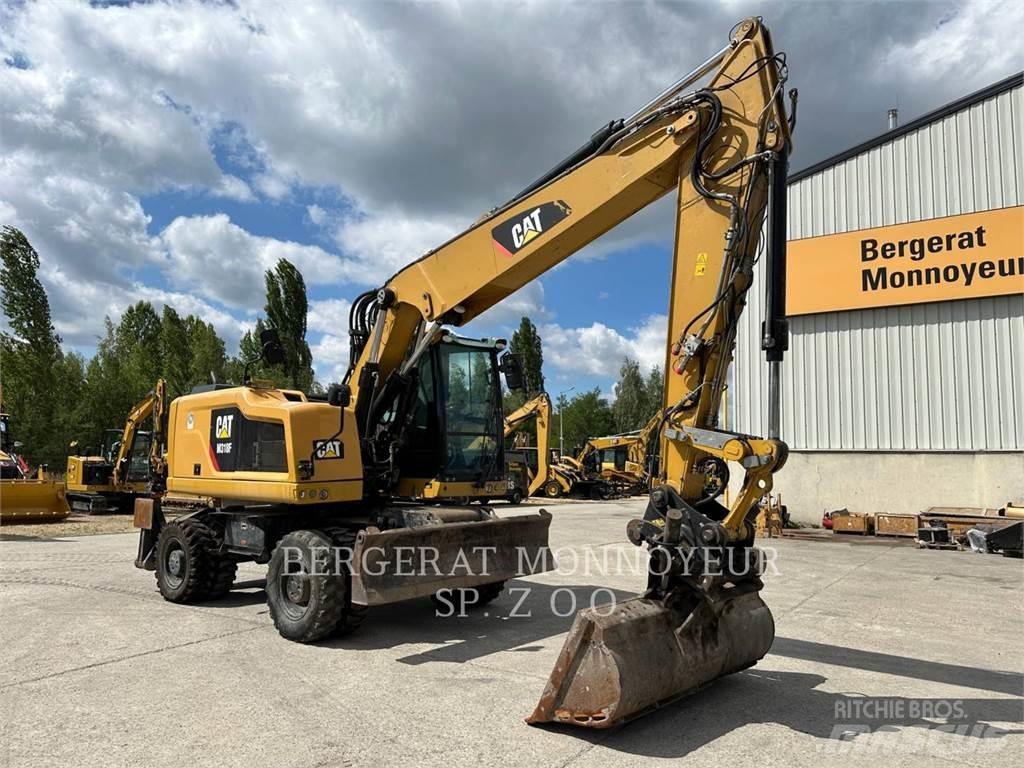 CAT M318F Pelle sur pneus