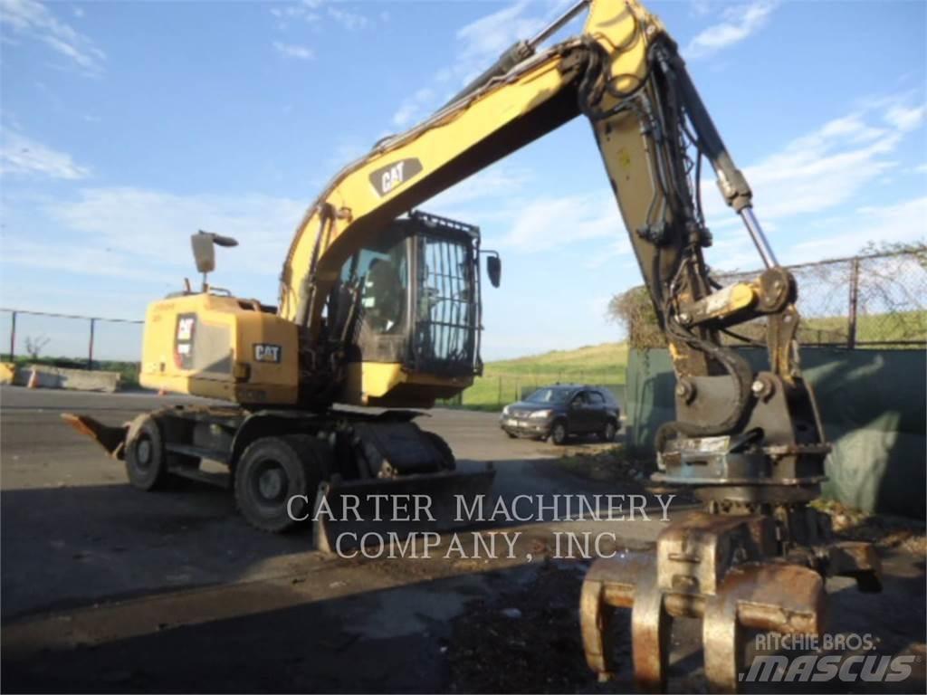 CAT M318F Pelle sur pneus