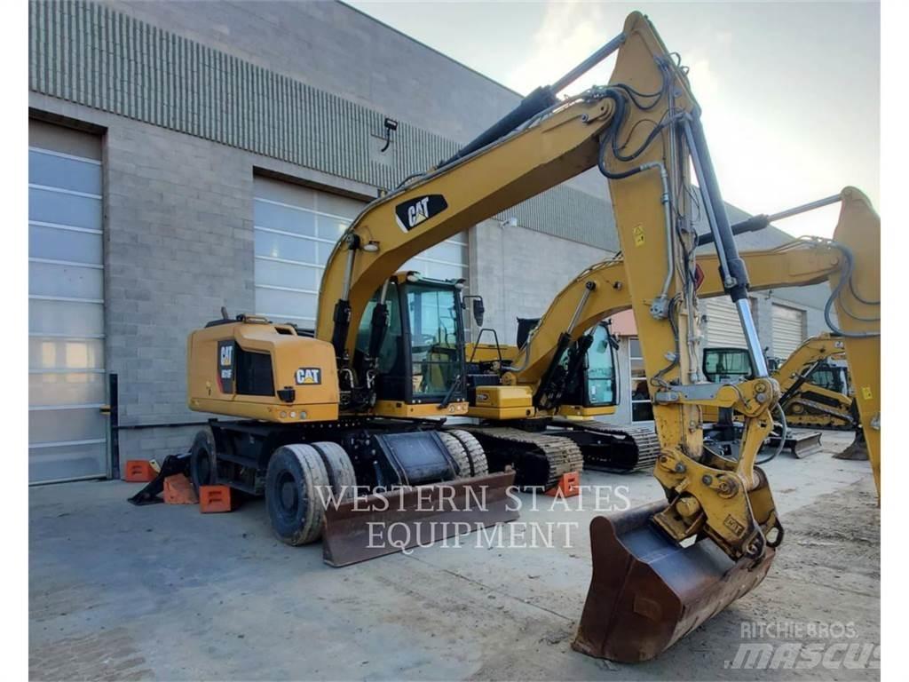 CAT M318F Pelle sur pneus
