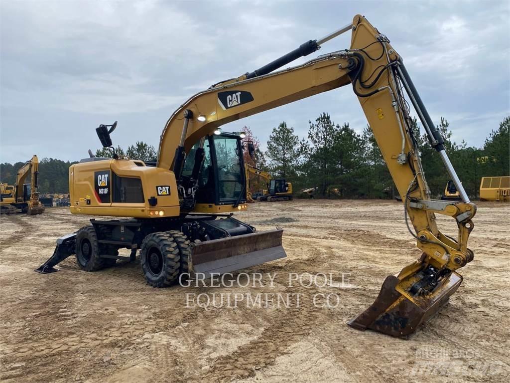 CAT M318F Pelle sur pneus