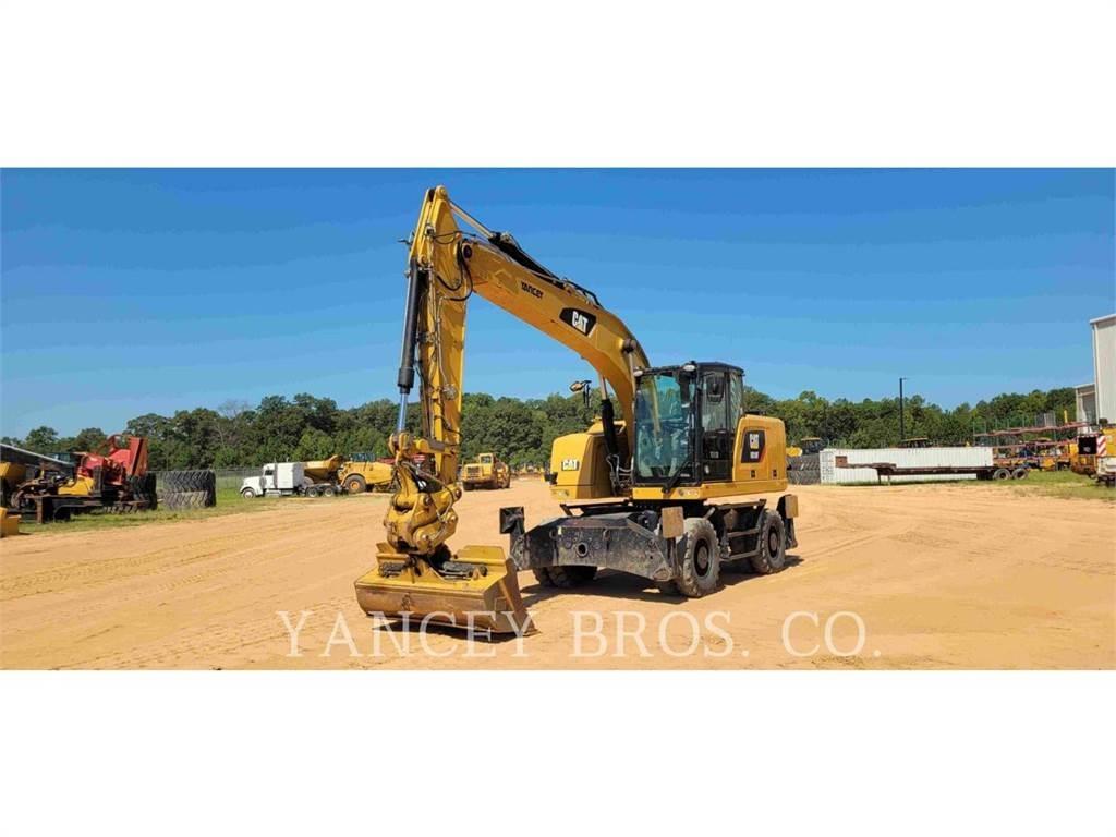 CAT M318F Pelle sur pneus