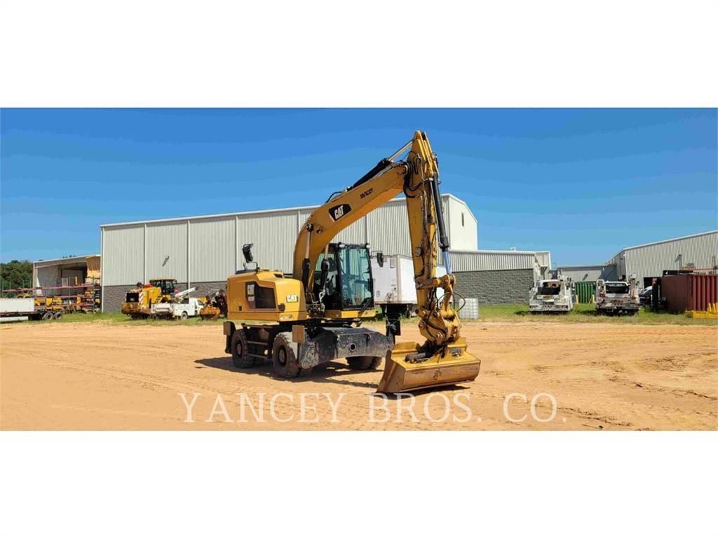 CAT M318F Pelle sur pneus