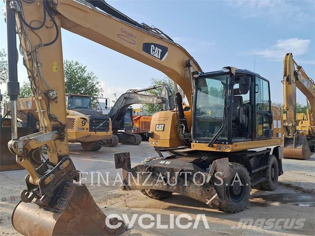 CAT M318F Pelle sur pneus