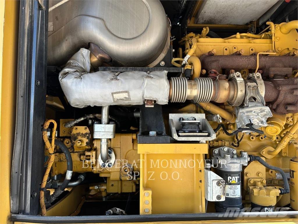 CAT M318F Pelle sur pneus