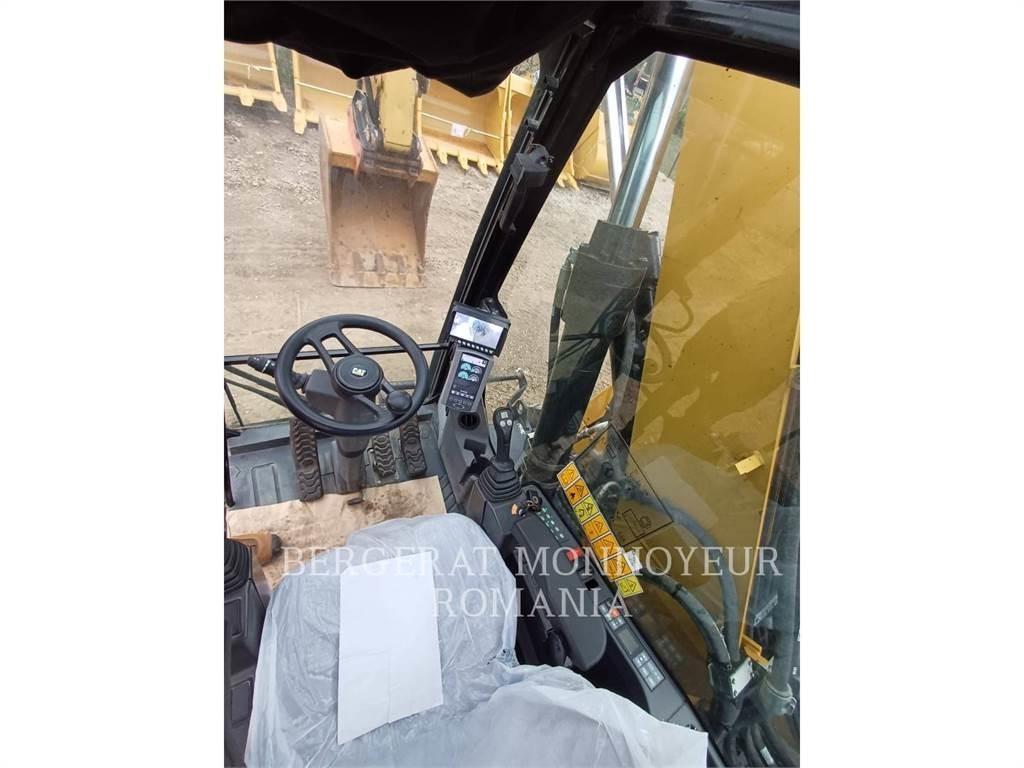CAT M318F Pelle sur pneus