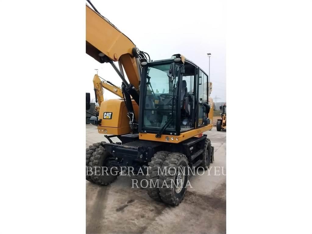 CAT M318F Pelle sur pneus