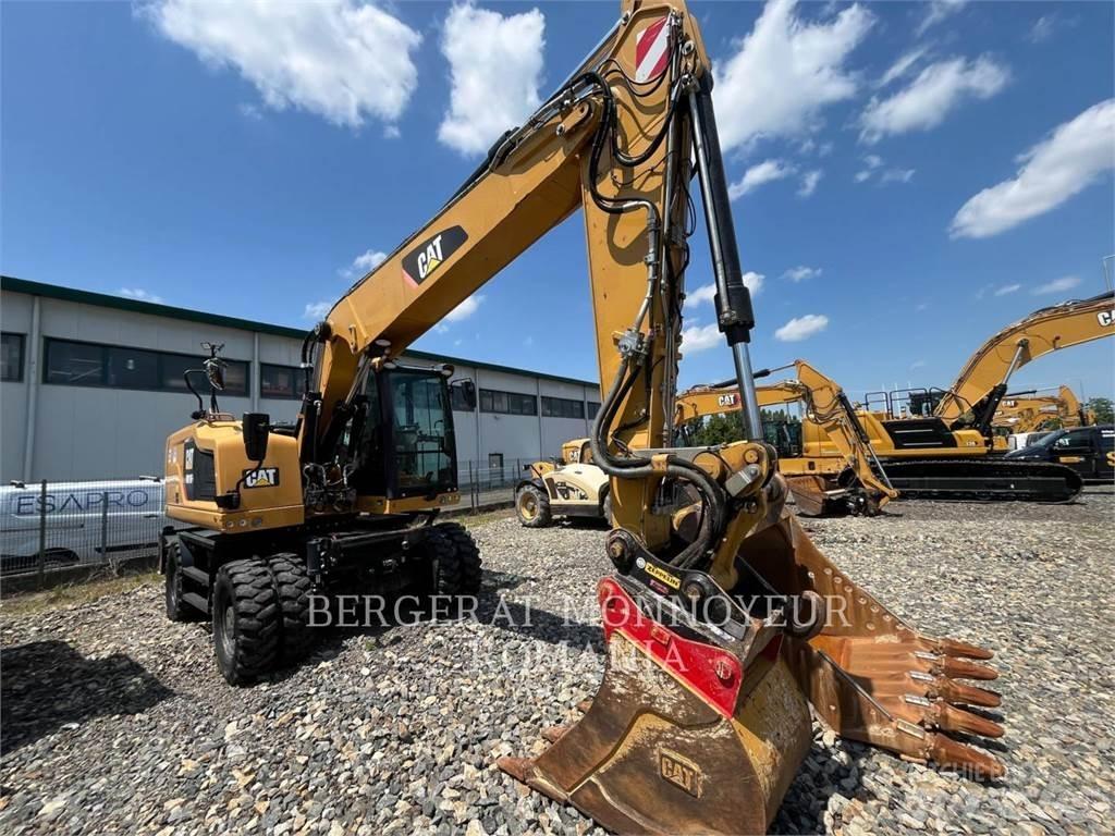 CAT M318F Pelle sur pneus