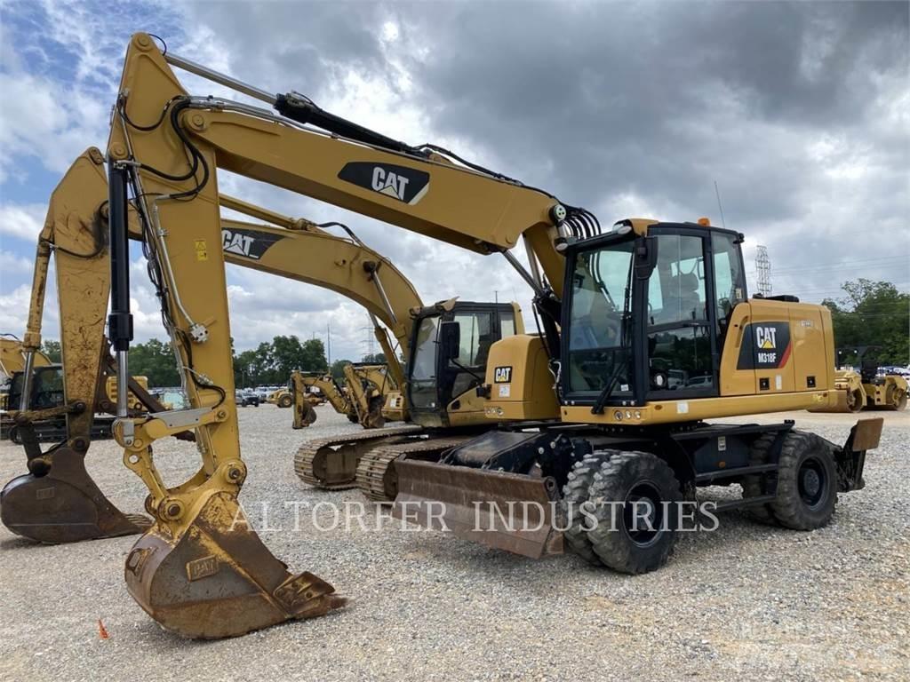 CAT M318F Pelle sur chenilles