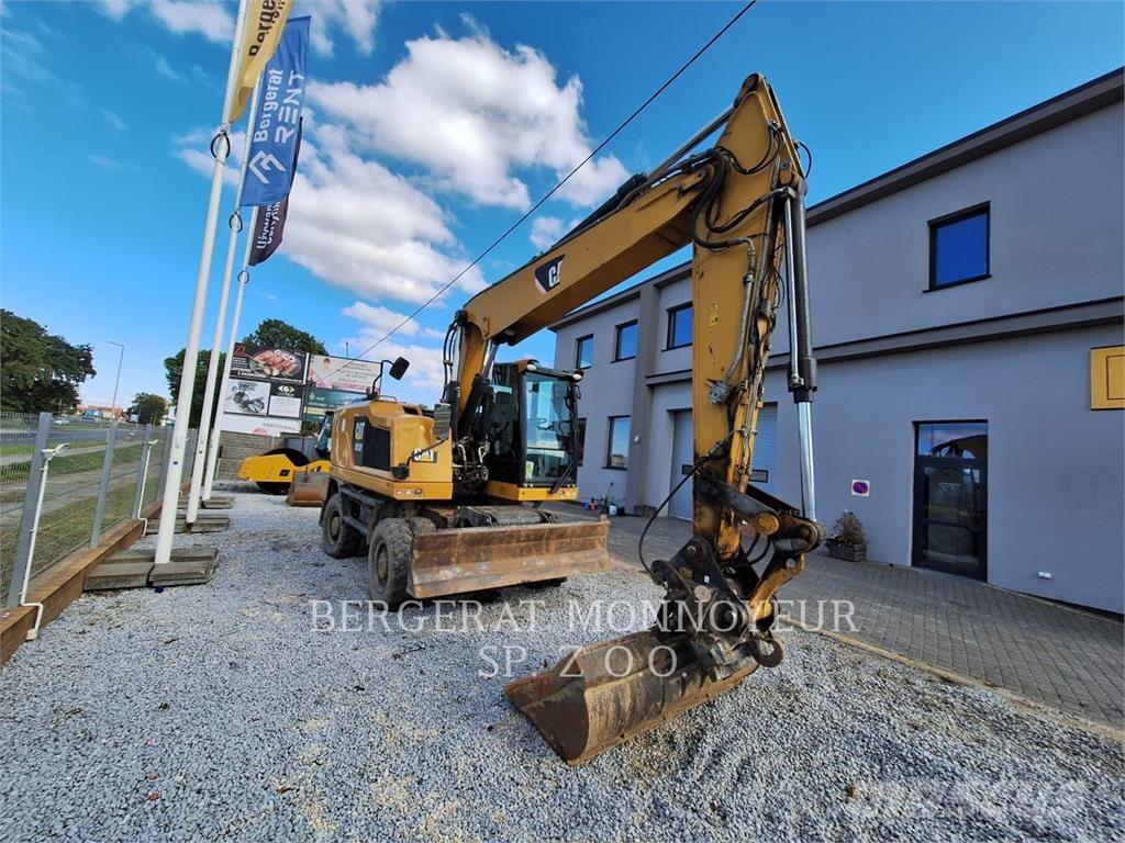CAT M318F Pelle sur pneus